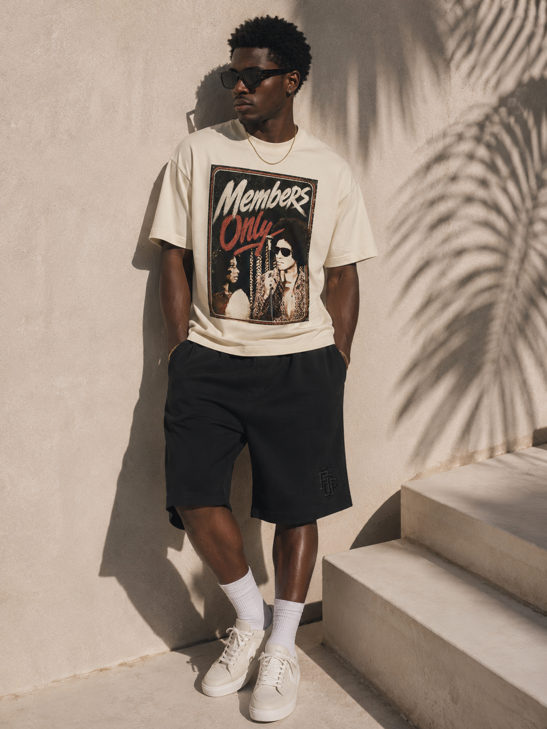 Model wearing the cream Memberz Only tee